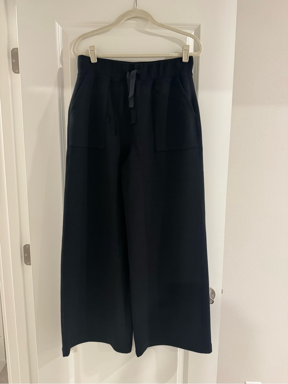 SPANX women’s Air Essentials Ribbed Wide-Leg Drawstring Pants in Black